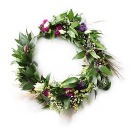Beautiful wreath made of flowers and leaves on white table, top view