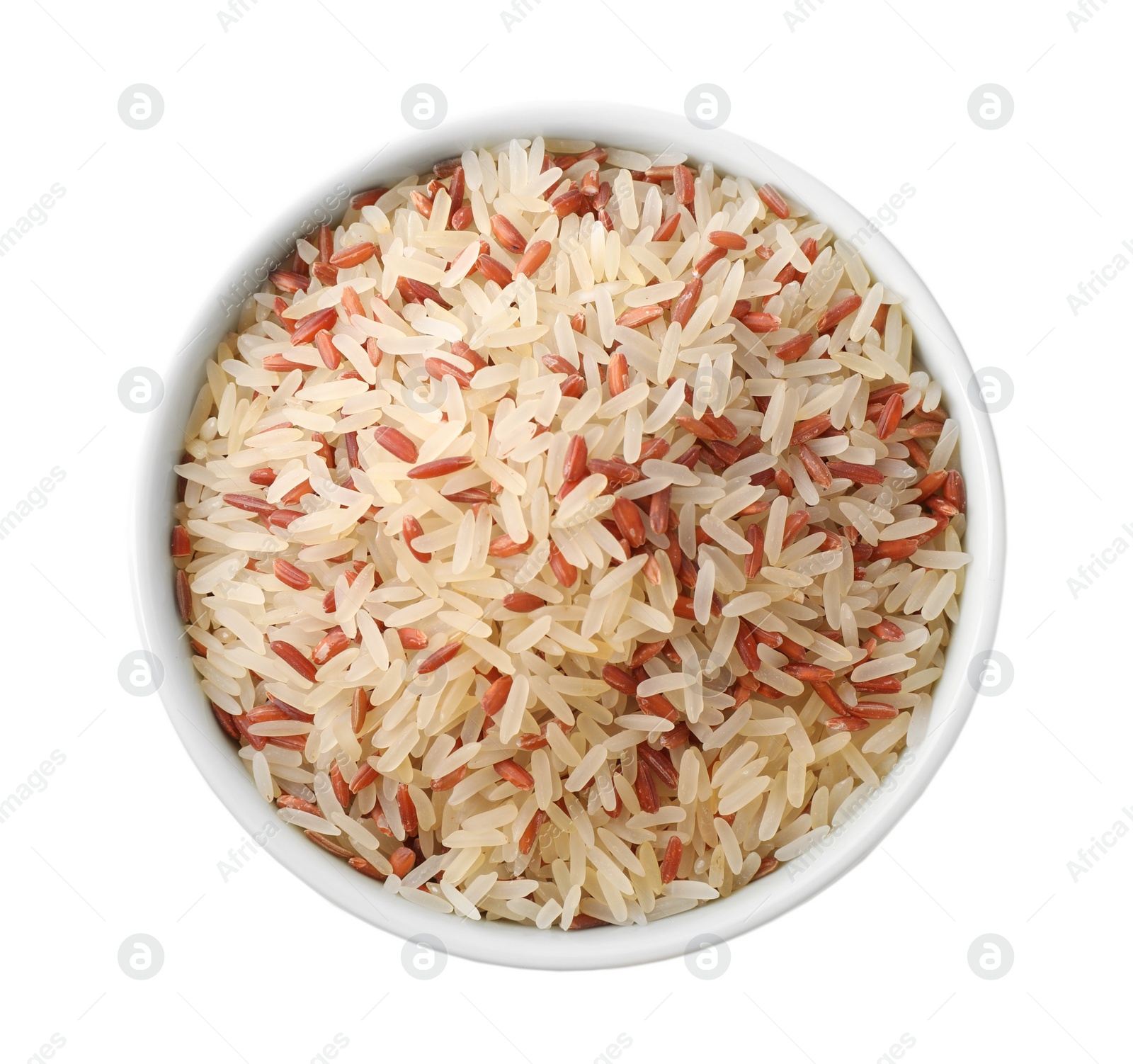 Photo of Mix of brown and polished rice in bowl isolated on white, top view