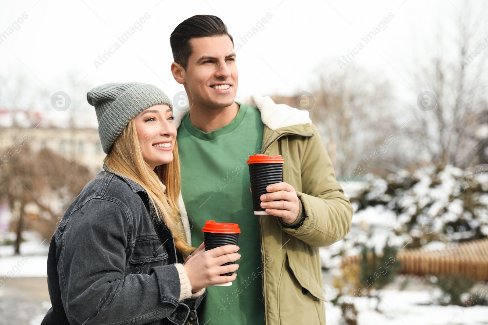 Photo of Beautiful happy couple outdoors on winter day