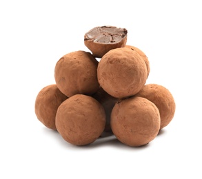 Delicious raw chocolate truffles on white background