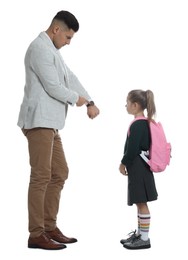 Photo of Teacher pointing on wrist watch while scolding pupil for being late against white background