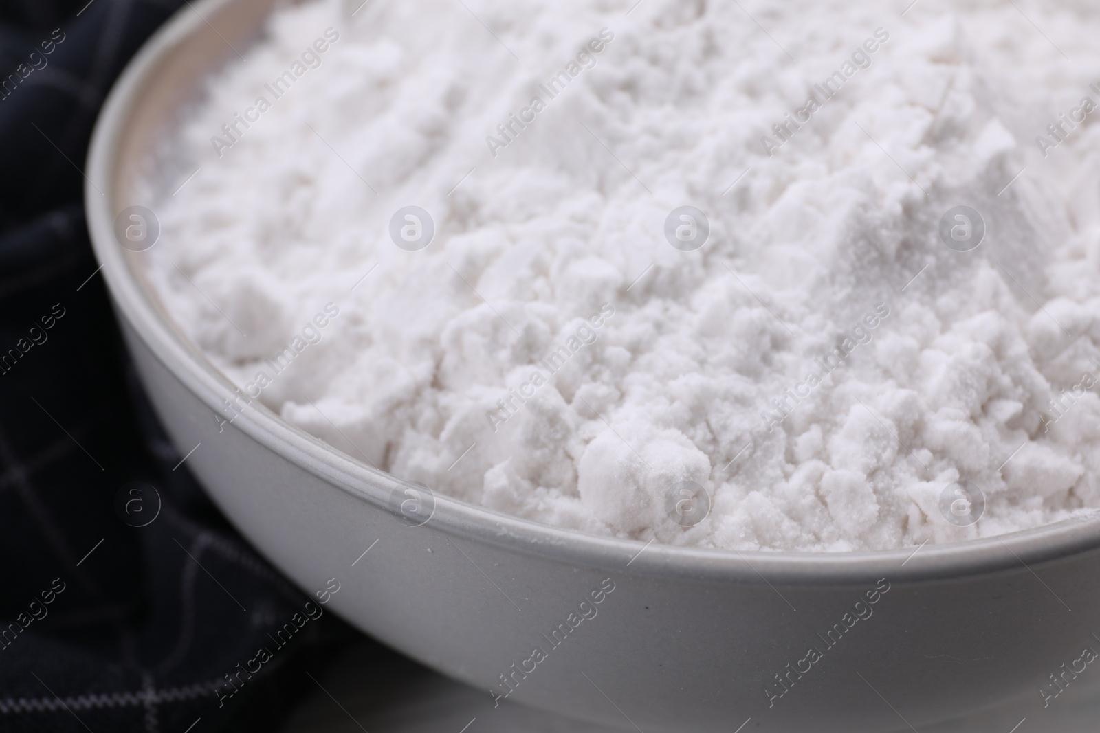 Photo of Starch in bowl on table, closeup view