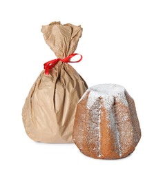 Photo of Delicious Pandoro cakes on white background. Traditional Italian pastry