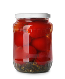 Pickled tomatoes in glass jar isolated on white