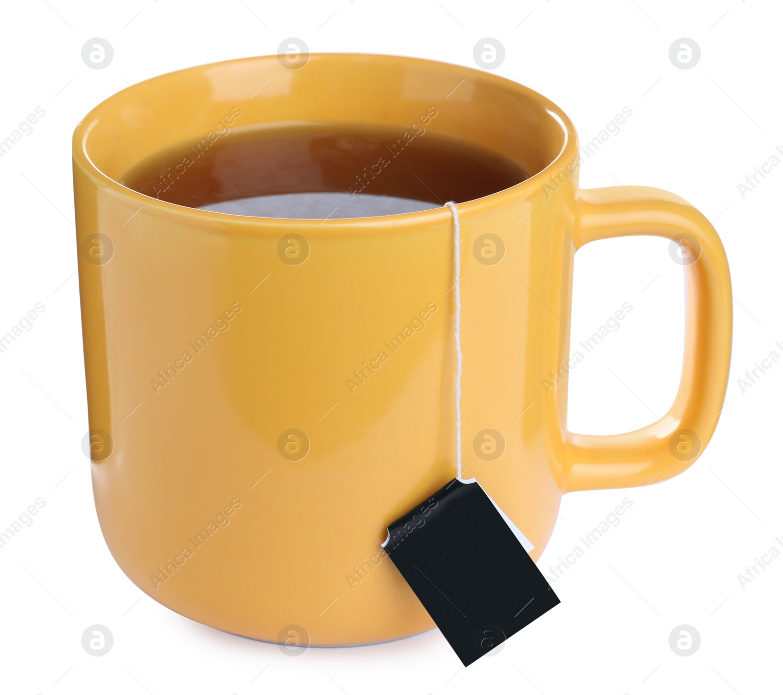 Photo of Yellow cup with teabag isolated on white