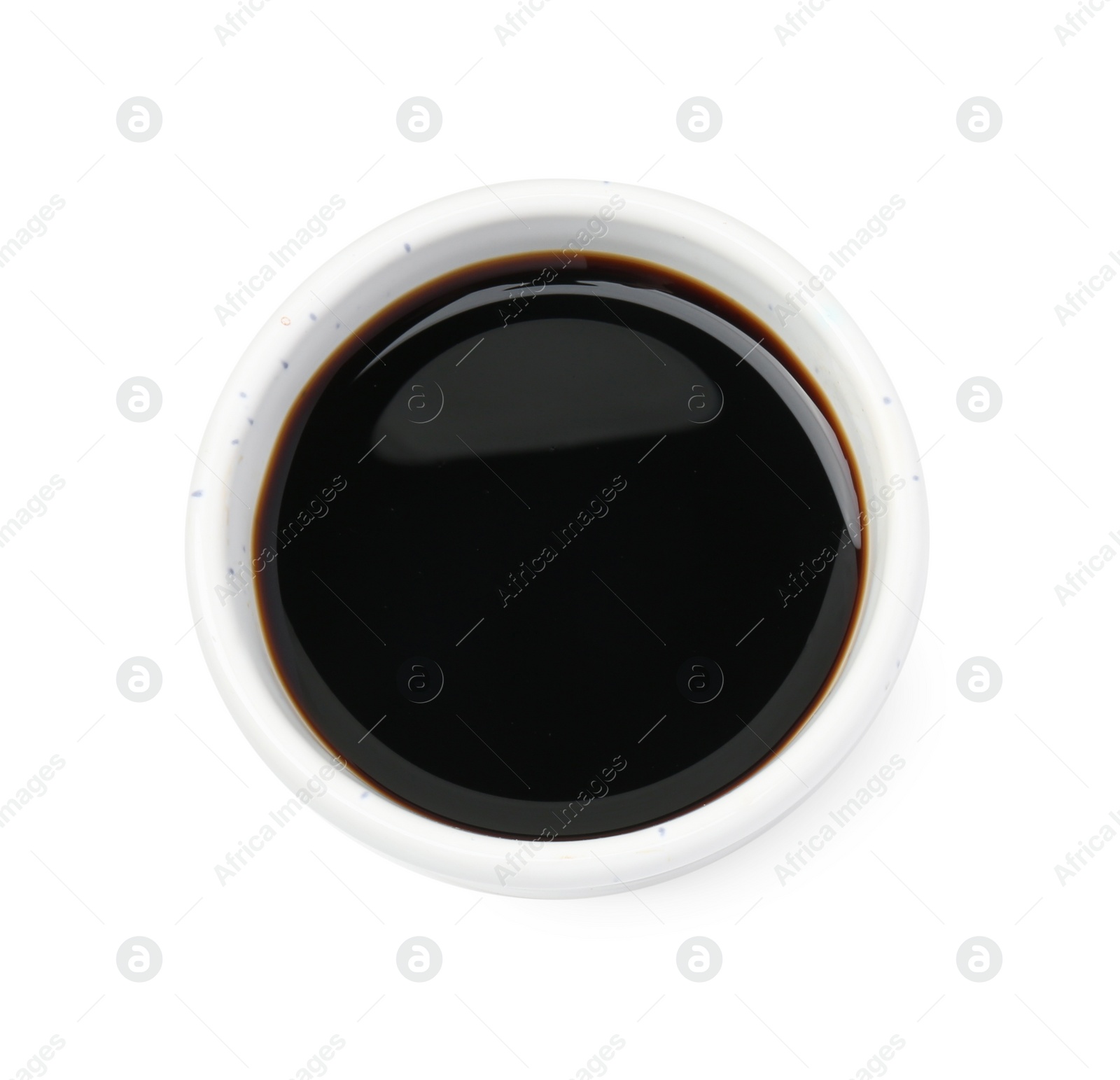 Photo of Tasty soy sauce in bowl isolated on white, top view