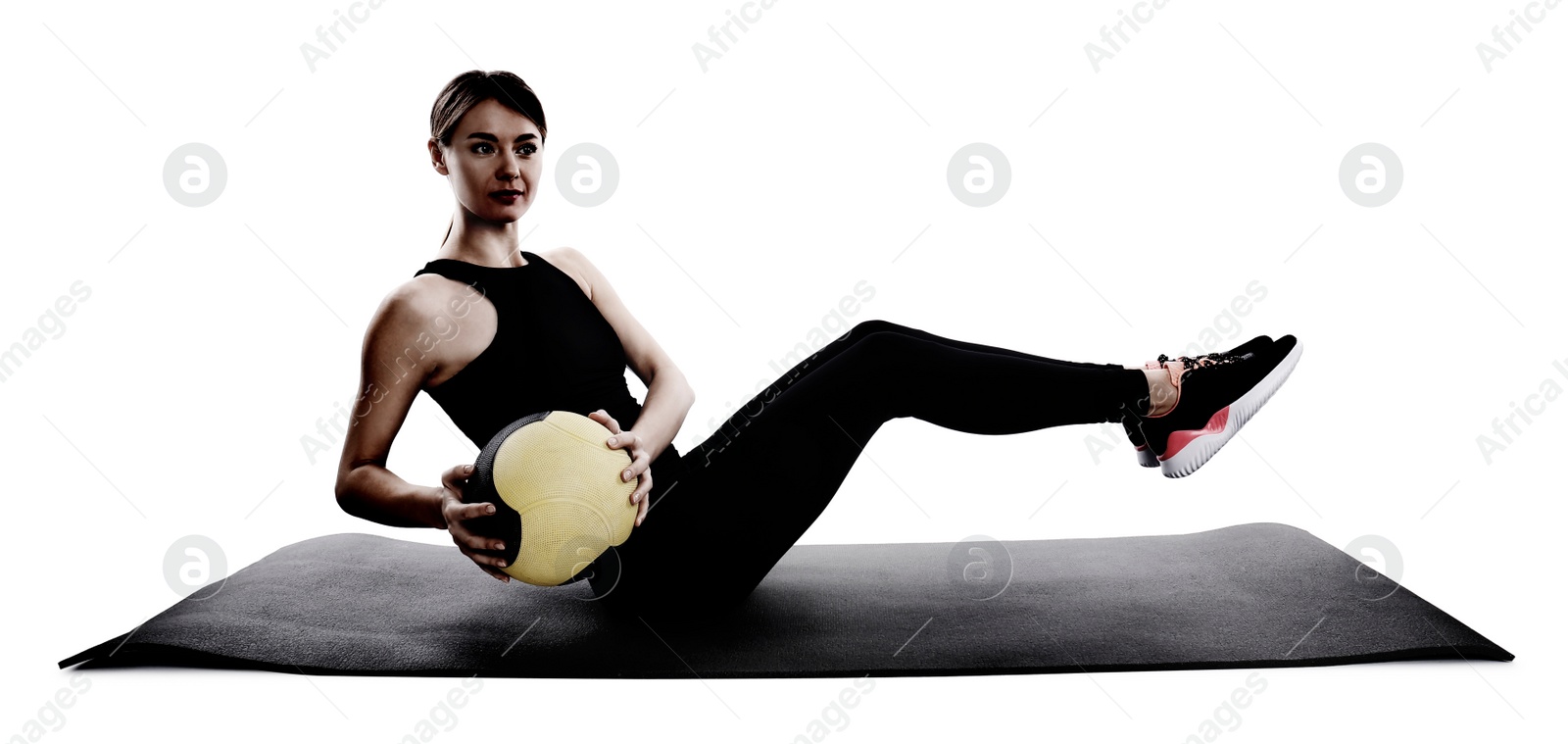 Image of Athletic woman doing exercise with medicine ball isolated on white