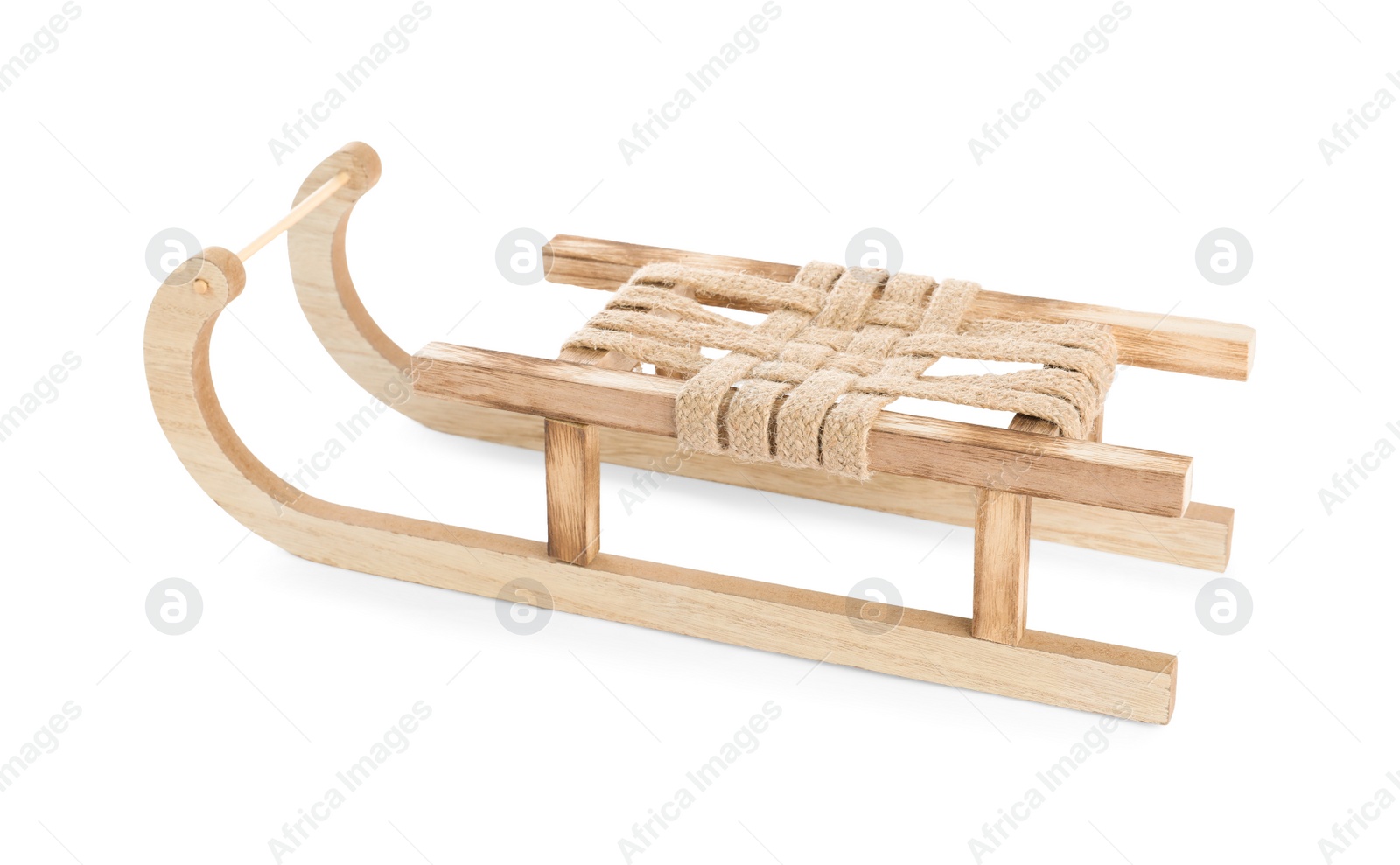 Photo of Wooden sleigh isolated on white. Christmas holiday decor