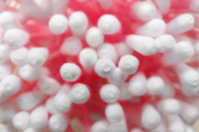 Photo of Many cotton buds as background, closeup view