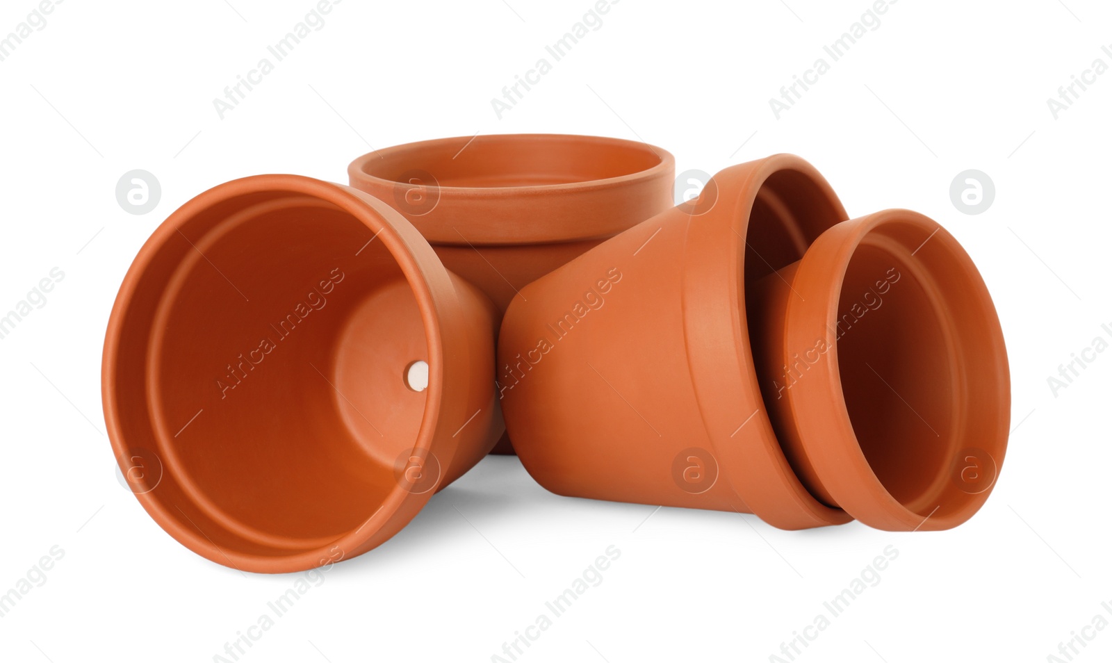 Photo of Empty clay flower pots isolated on white