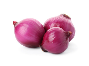 Photo of Fresh red onion bulbs isolated on white