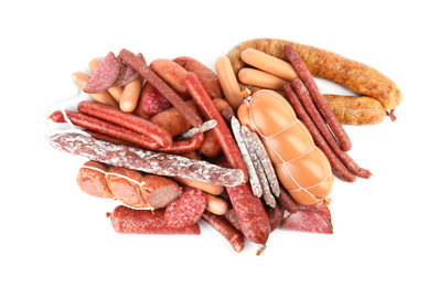 Photo of Different tasty sausages on white background, top view. Meat product