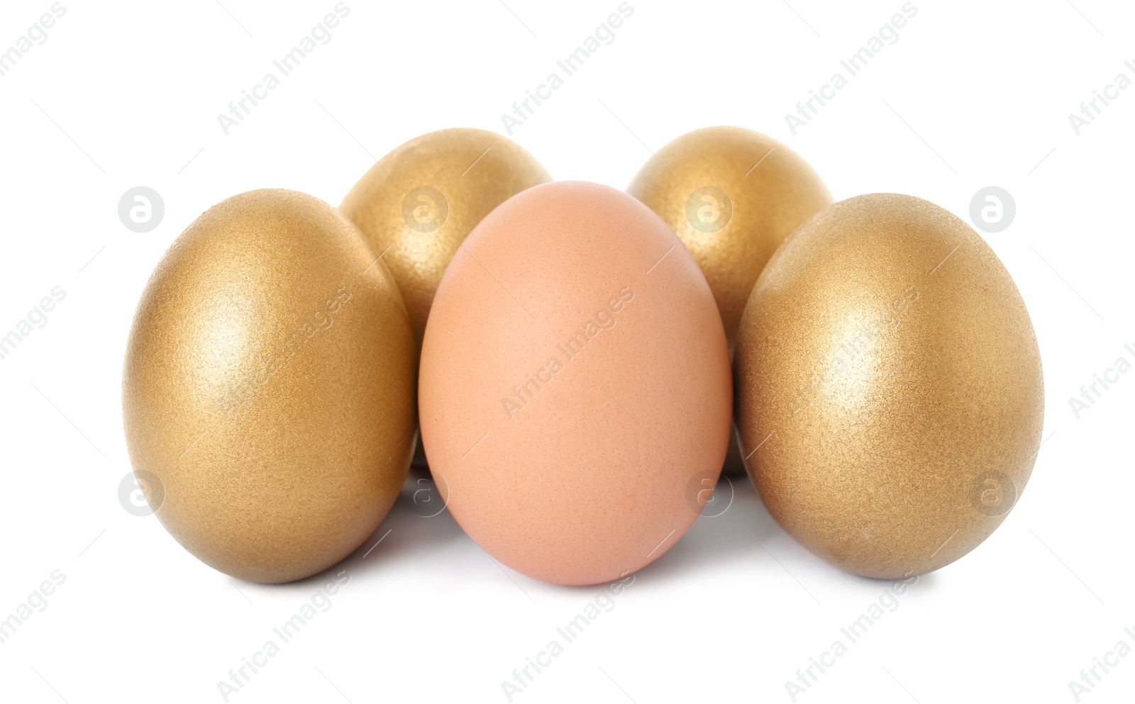 Photo of Golden eggs with different one on white background