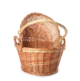 Photo of Two decorative wicker baskets on white background