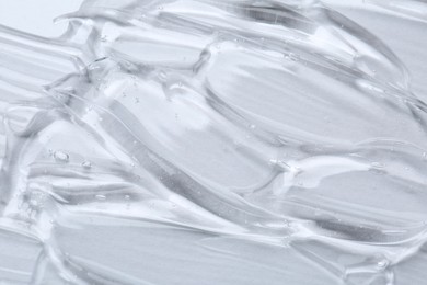 Photo of Cosmetic serum on white background, above view