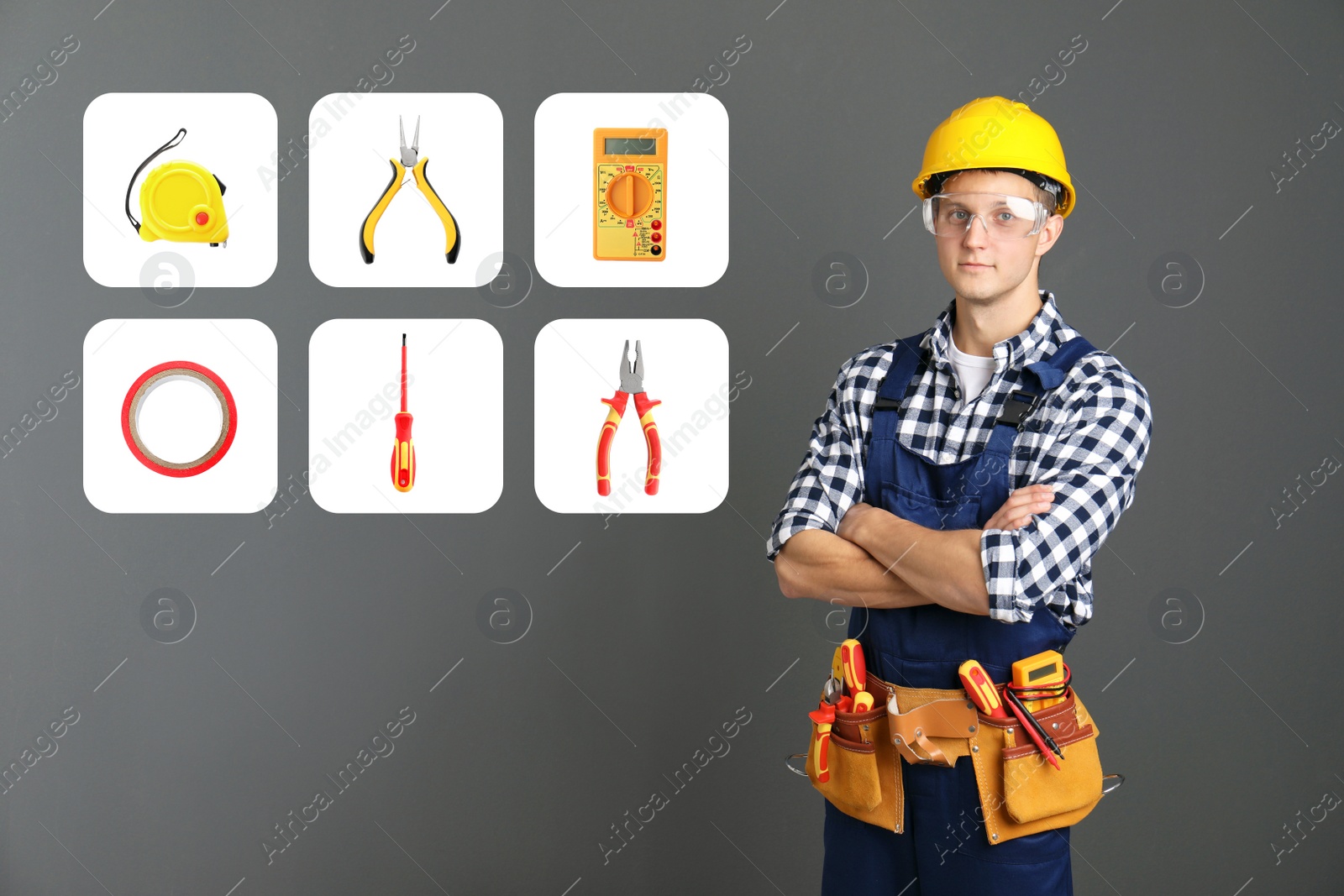 Image of Young electrician and tools and grey background