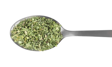 Photo of Spoon with dried parsley on white background, top view