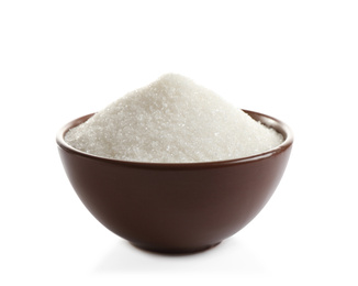 Photo of Granulated sugar in bowl isolated on white