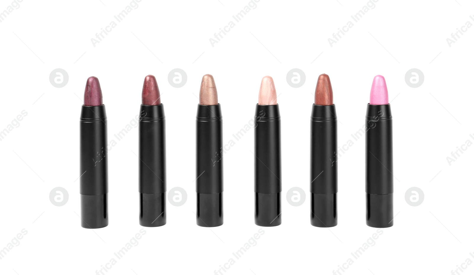 Photo of Set of colorful lipsticks isolated on white