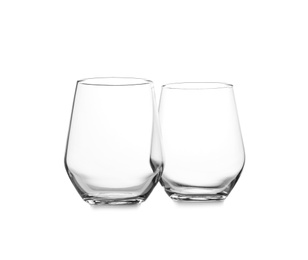 Photo of New clean empty glasses isolated on white