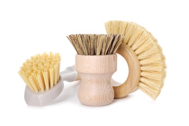 Photo of Cleaning supplies. Different brushes isolated on white