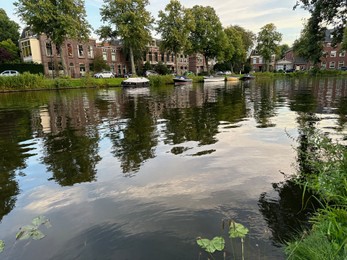 Photo of Beautiful view of canal with moored boats outdoors