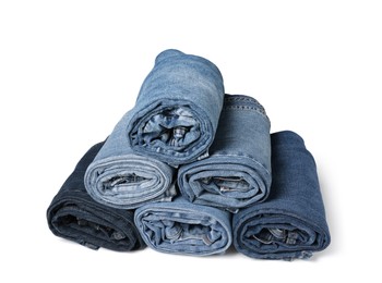 Image of Different stylish rolled jeans isolated on white