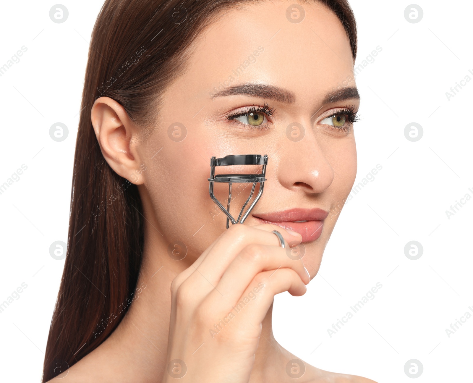 Photo of Woman with eyelash curler on white background