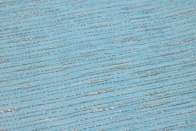 Stylish light blue wallpaper as background, closeup view