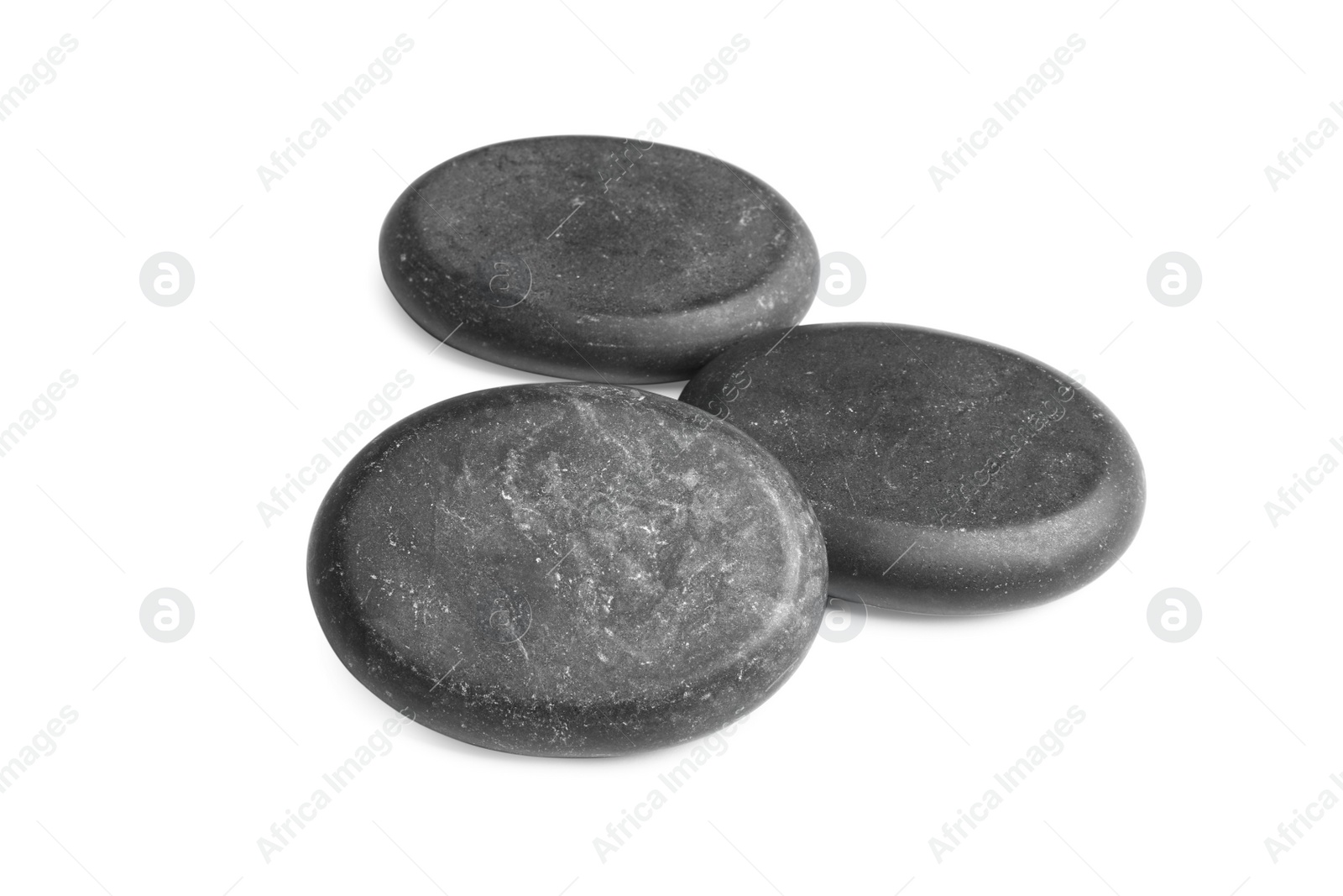 Photo of Group of black stones on white background