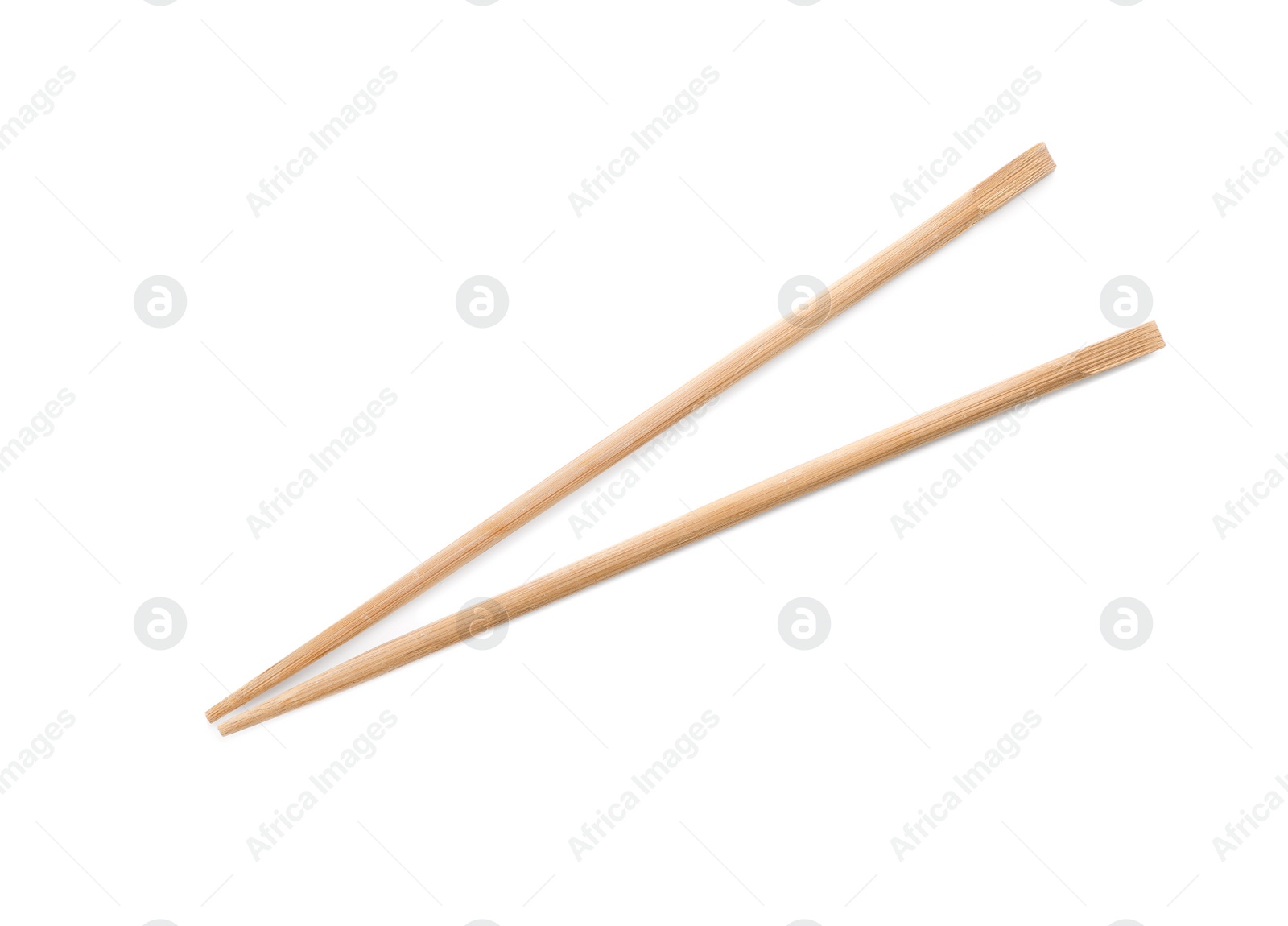 Photo of Chopsticks made of bamboo on white background, top view