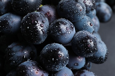 Photo of Bunch of fresh ripe juicy grapes as background. Closeup view