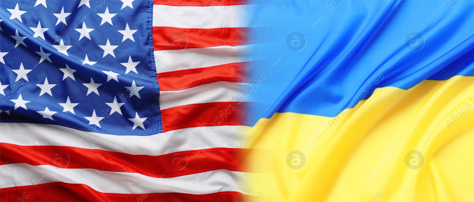 Image of National flags of Ukraine and USA symbolizing partnership between countries. Banner design