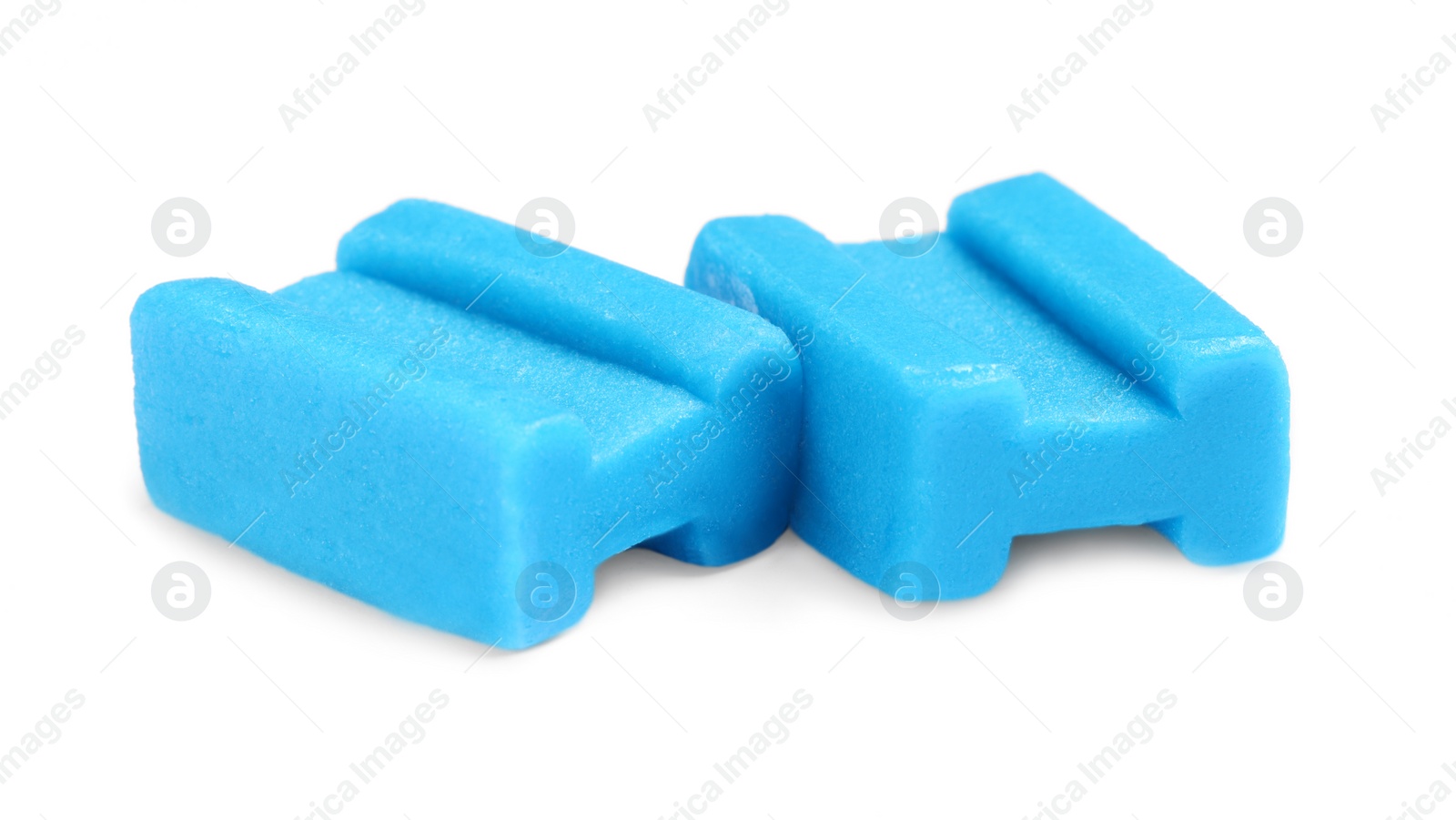 Photo of Tasty blue bubble gums isolated on white