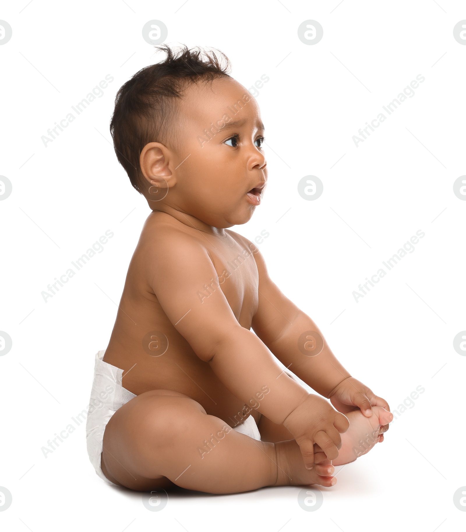 Photo of Adorable African-American baby in diaper on white background