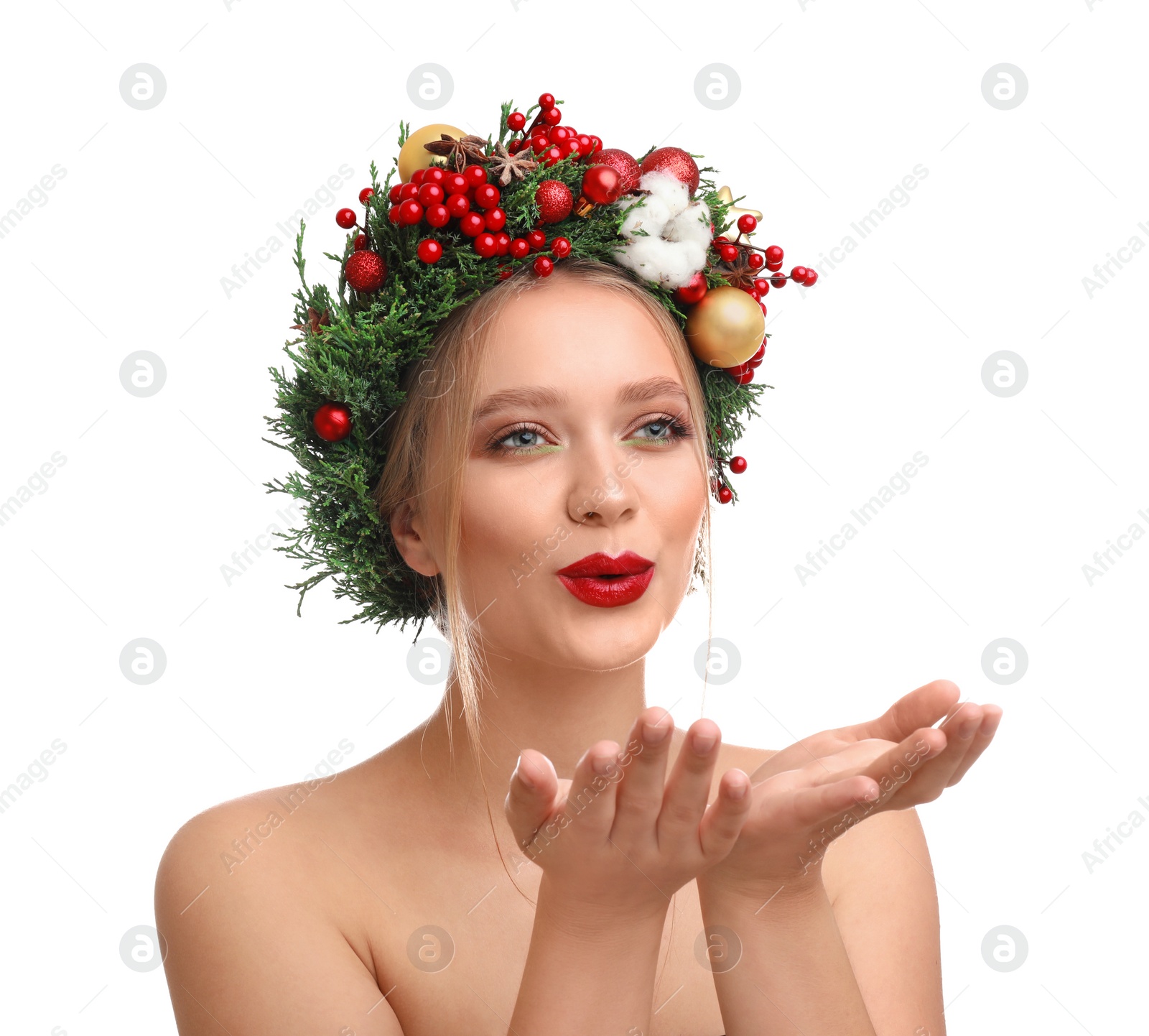 Photo of Beautiful young woman wearing Christmas wreath on white background