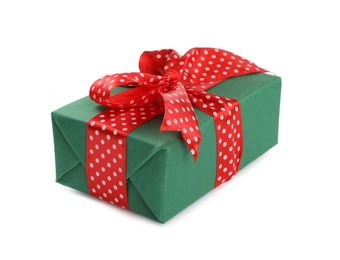 Photo of Christmas gift box decorated with red bow isolated on white