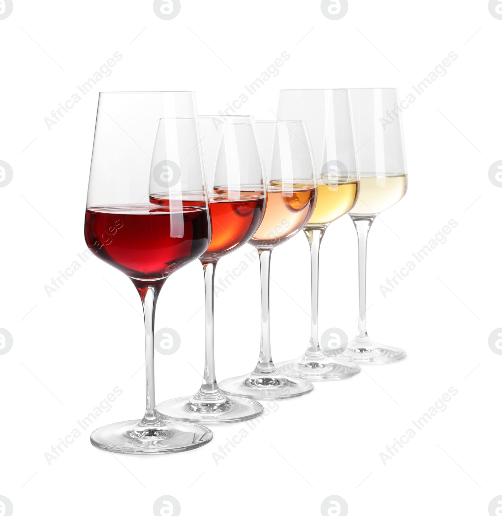 Photo of Row of glasses with different wines on white background