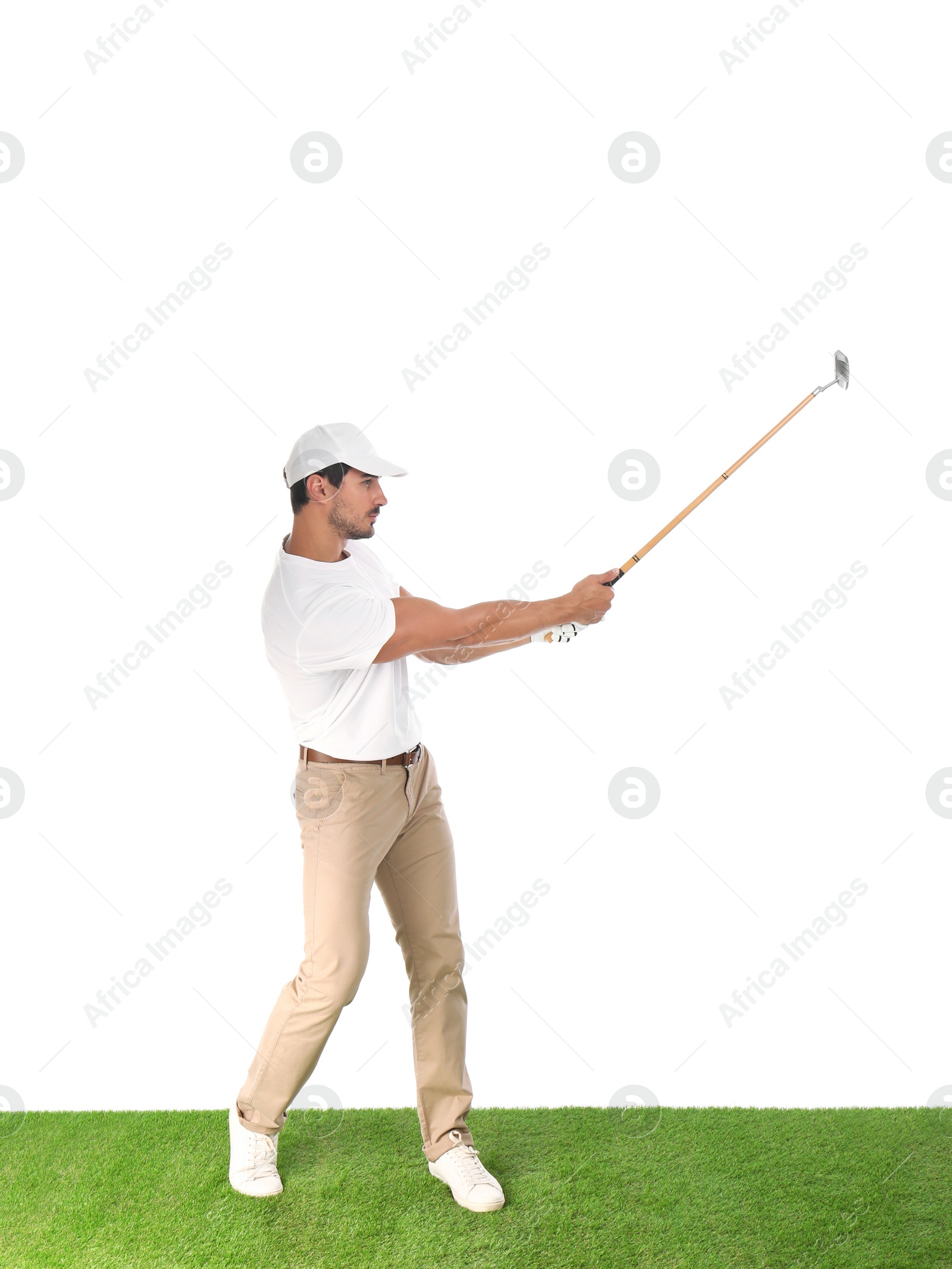 Photo of Young man playing golf on white background