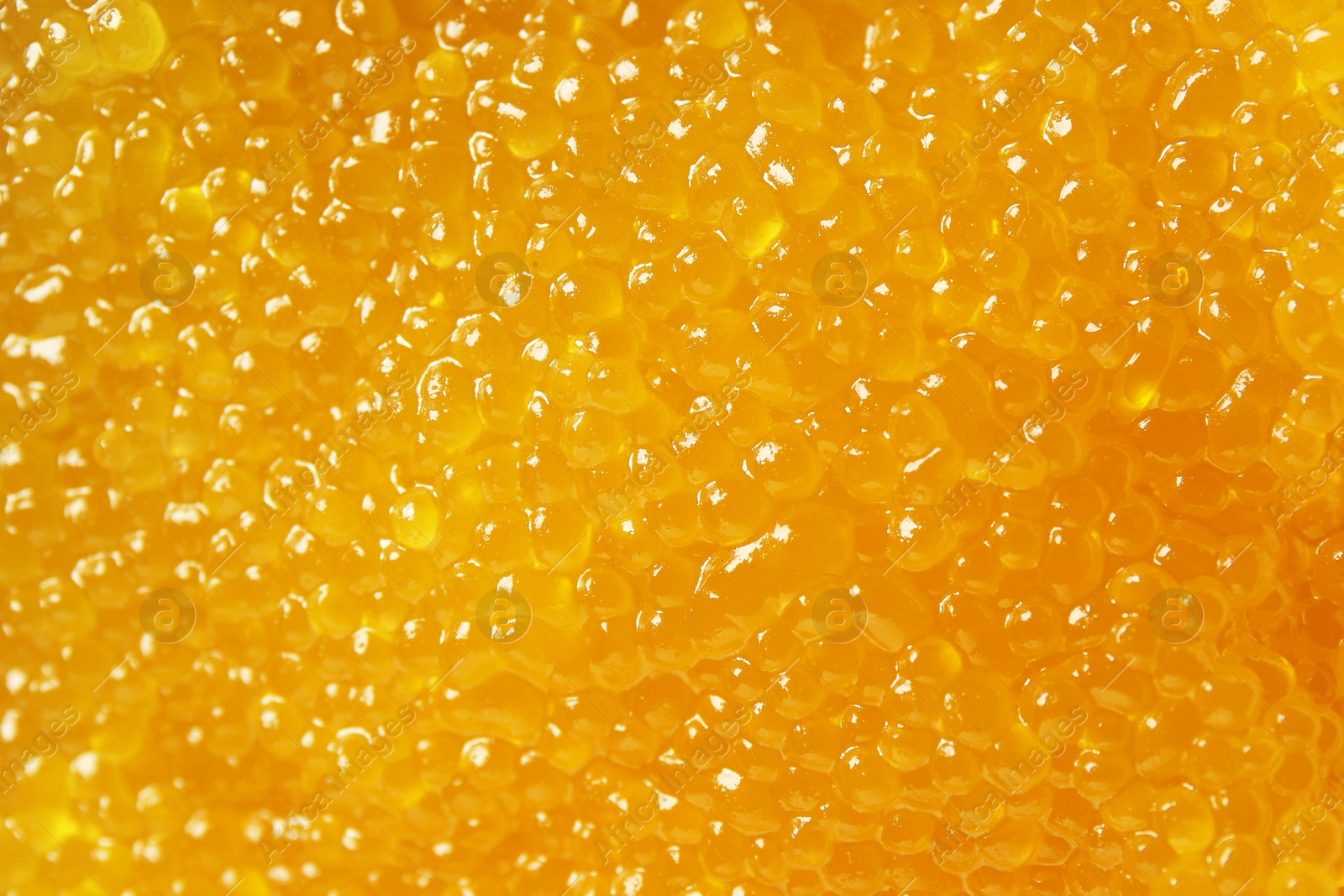 Photo of Fresh pike caviar as background, top view