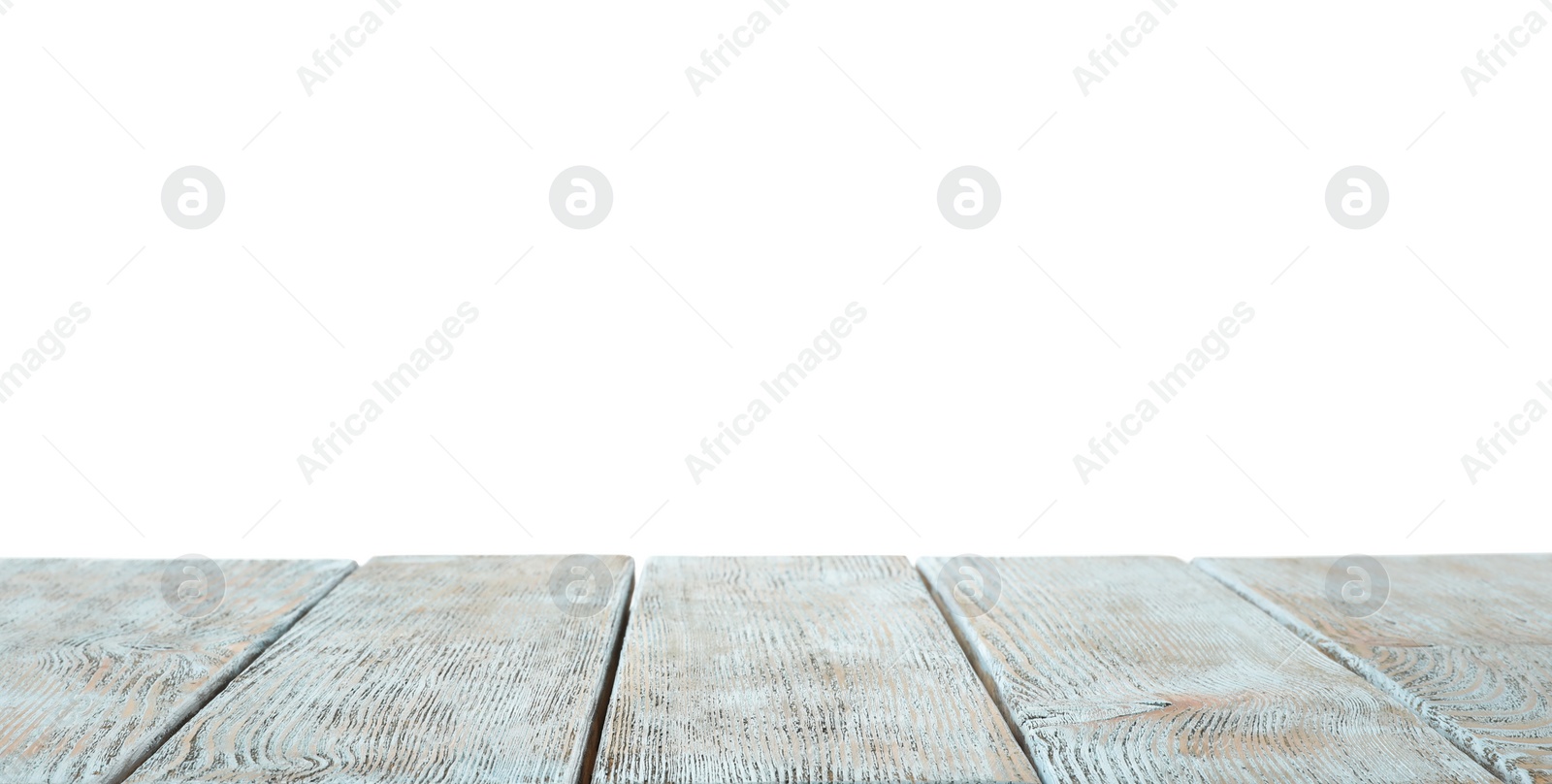 Photo of Empty wooden table surface on white background. Mockup for design