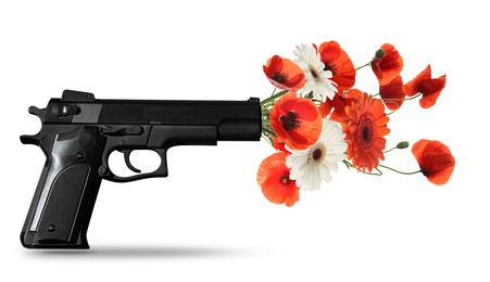 Image of Beautiful blooming flowers and handgun on white background. Peace instead of war