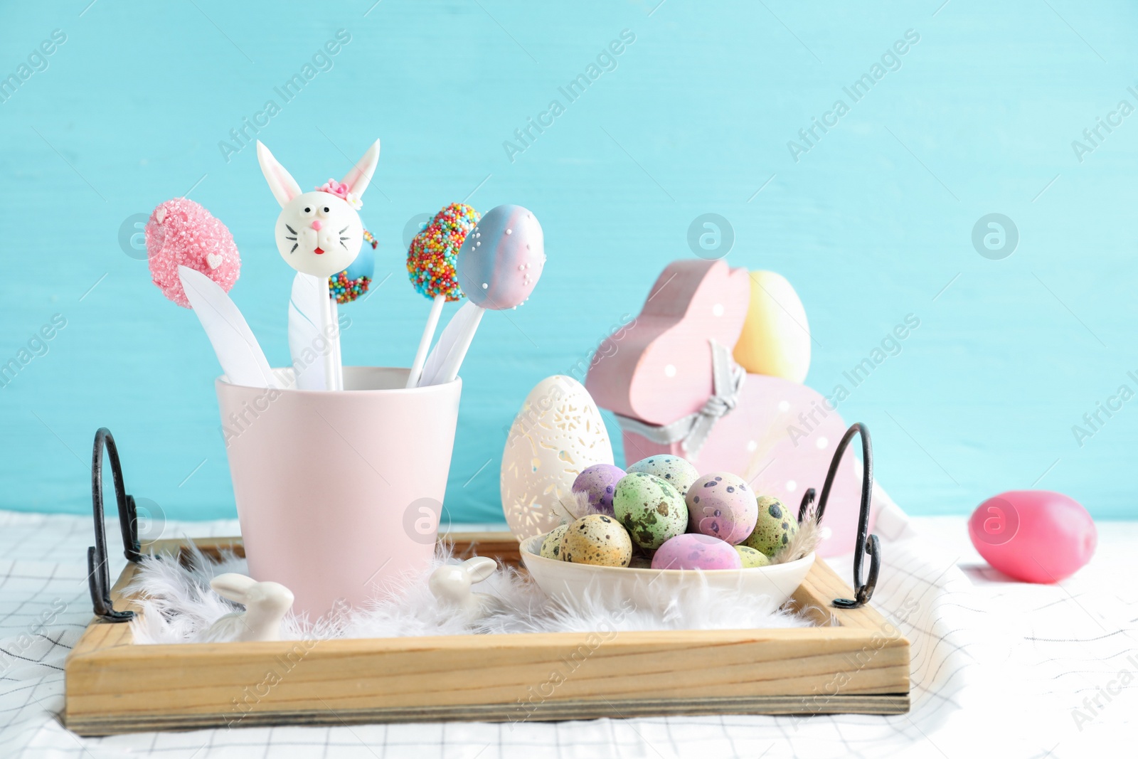 Photo of Different cake pops on table. Easter holiday