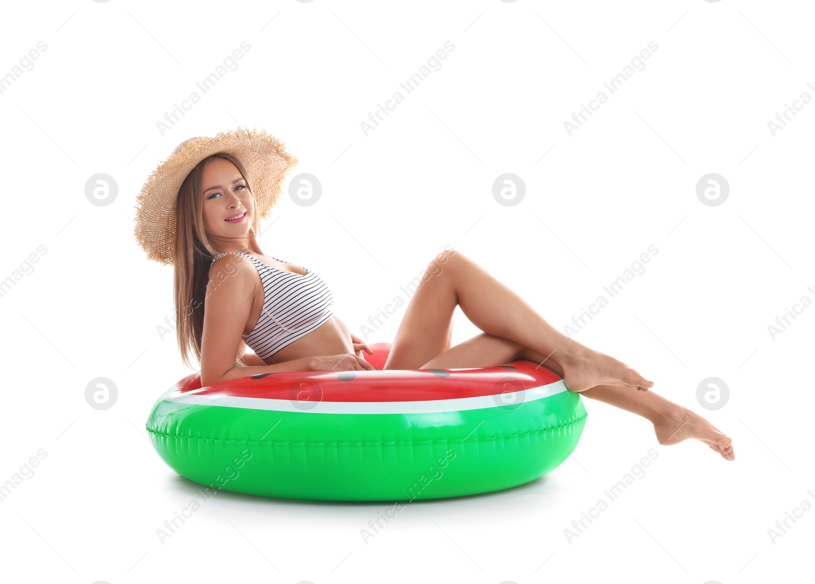 Photo of Sexy young woman in bikini with inflatable ring on white background