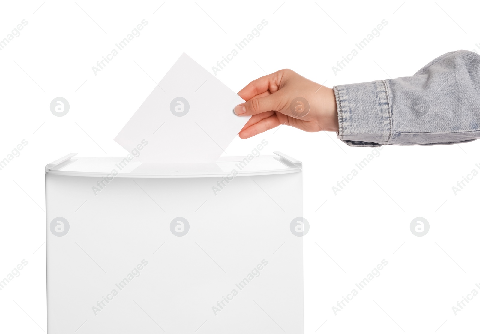 Photo of Woman putting her vote into ballot box on white background, closeup