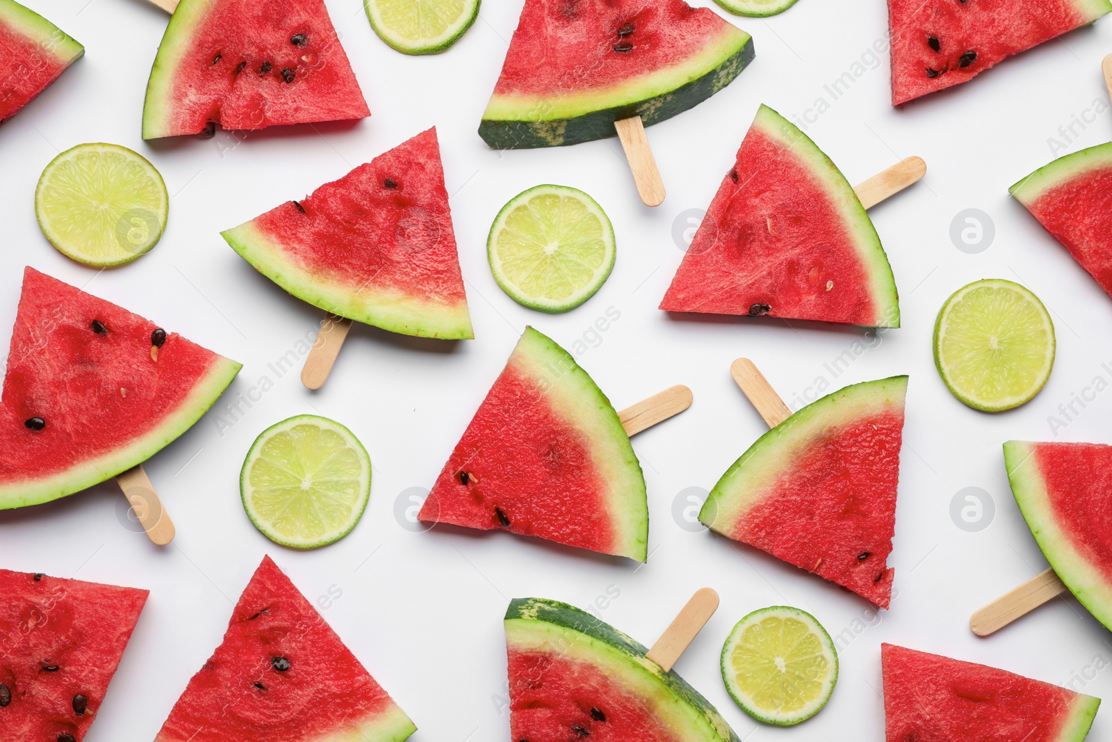 Photo of Tasty sliced watermelon and lime on white background, top view