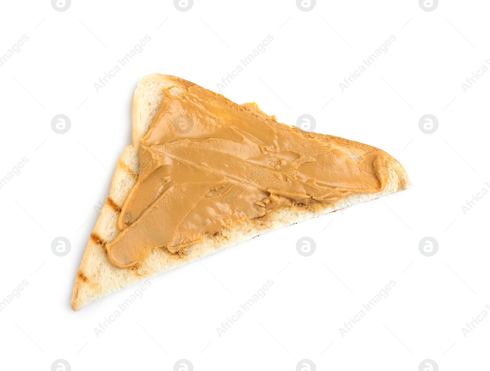 Photo of Slice of bread with peanut butter on white background, top view