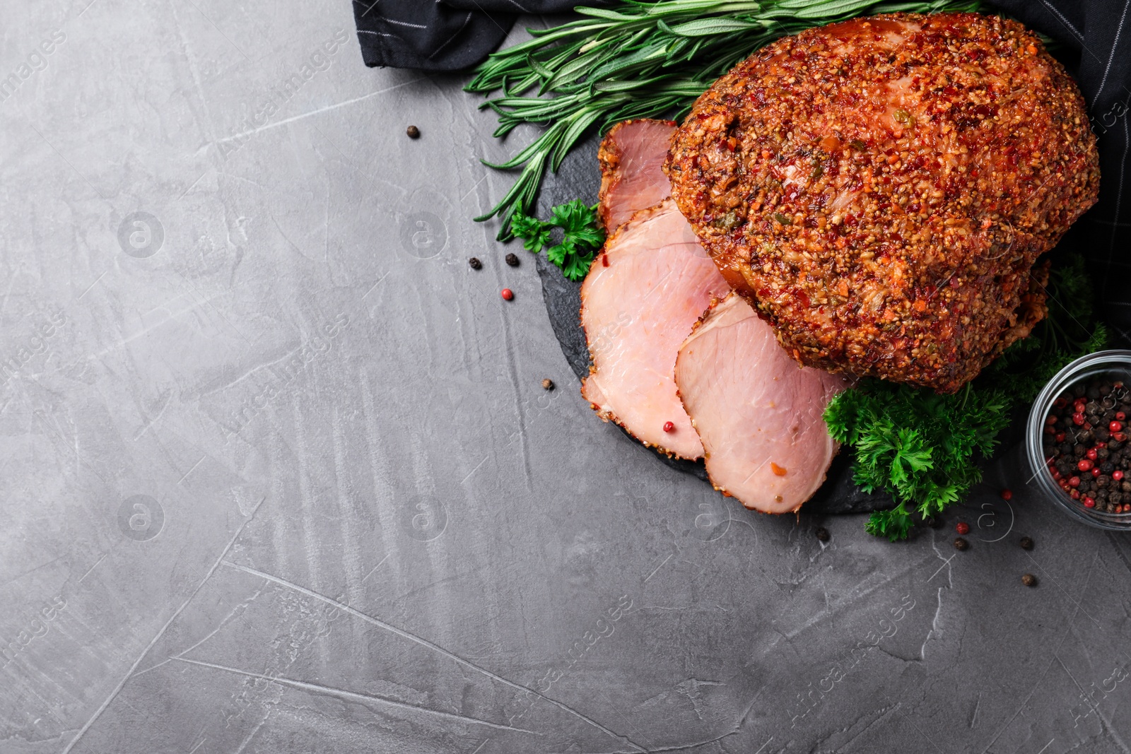 Photo of Homemade delicious ham on grey background, flat lay with space for text. Festive dinner