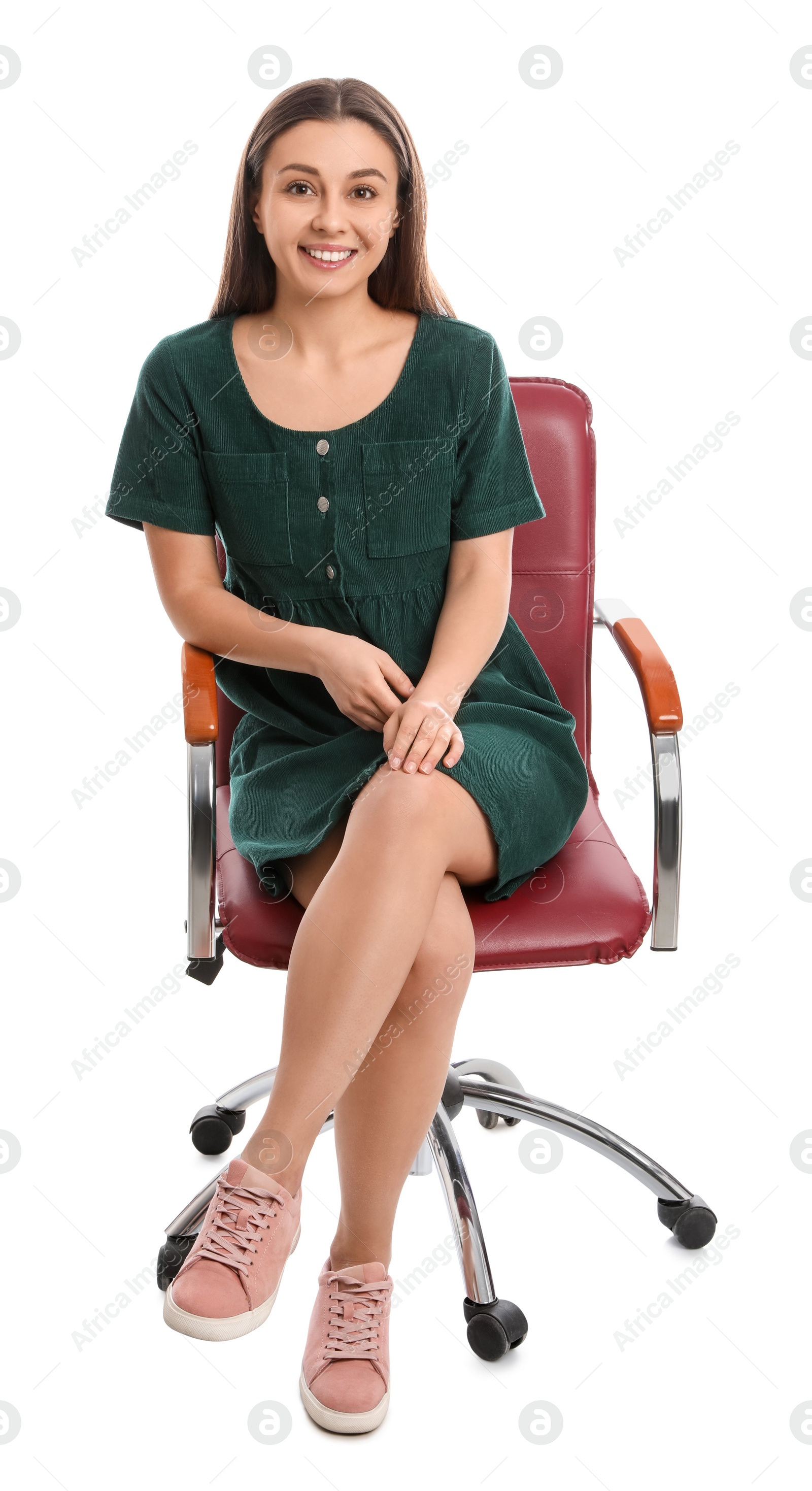 Photo of Young woman sitting in comfortable office chair on white background