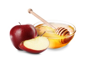 Image of Honey in bowl and apples isolated on white